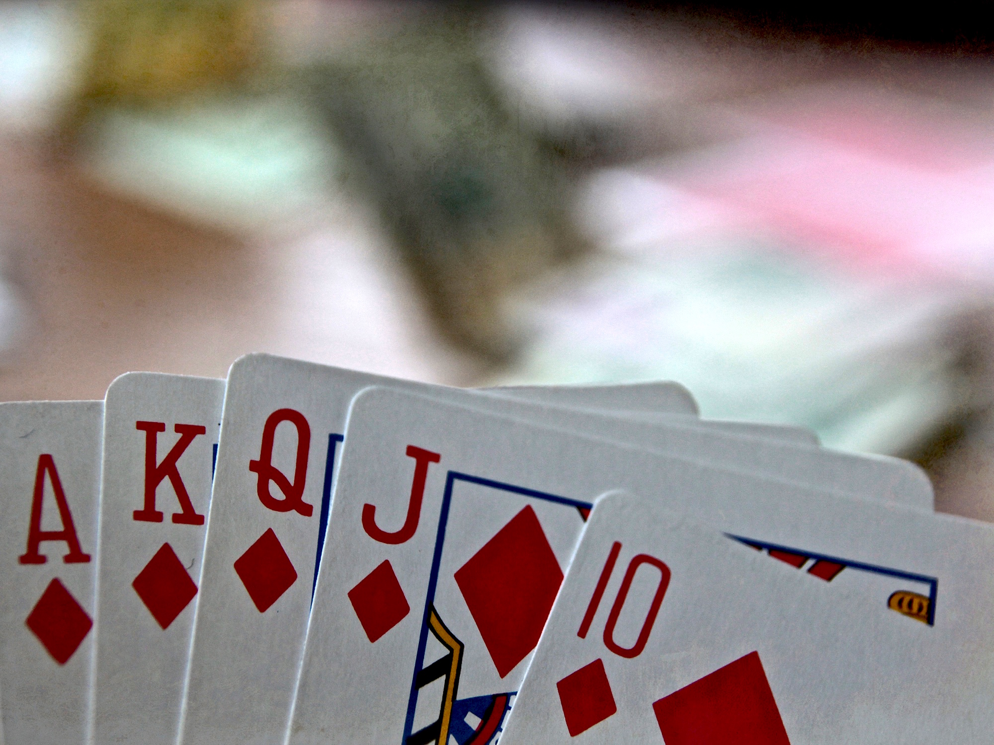 white-number-red-color-cards-shape-emotion-poker-odc-onthetable-texturebyskeletalmess-324651.jpg